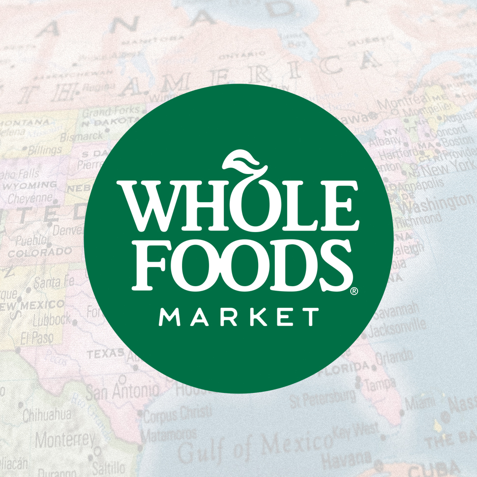 Whole Foods Market logo against a map background of North America.